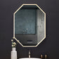 Image is photo of eight sided mirror—taller than wide, above a bathroom vanity.